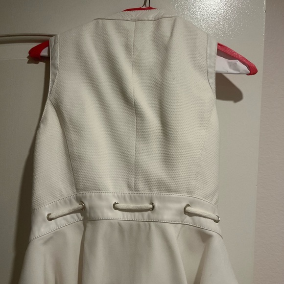 Beautiful fitted top with leather trim around neck area . - Picture 3 of 4